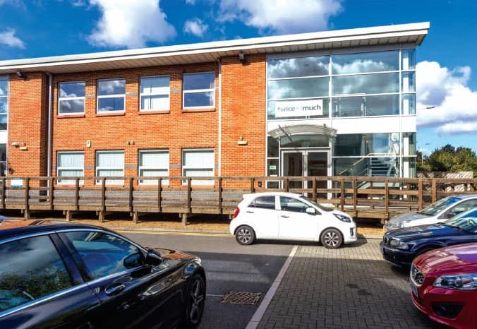 Two-storey red-brick office building with a glazed entrance at 2 Winnersh Fields, Gazelle Close, Wokingham